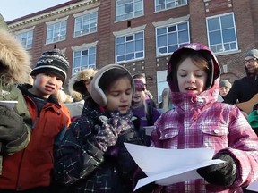 Kids and parents  in the schoolyard at Hopewell Avenue Public School launch a campaign to raise $200,000 by March to plant trees and shade structures in the playground. The trees were removed because they were damaged by the emerald ash borer beetle.