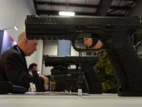 A handgun manufacturer product is displayed at the CANSEC trade show in Ottawa on Wednesday, May 28, 2014.