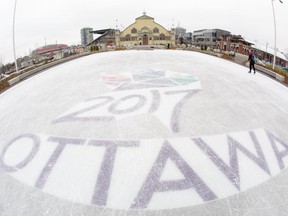 A lone skater uses the new outdoor rink installed at Lansdowne Park on November 30, 2014.