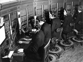 ADVANCE FOR RELEASE UNTIL 12:01 A.M. EST, FRIDAY, JAN 25, 2013. THIS PHOTO MAY NOT BE POSTED ONLINE, BROADCAST OR PUBLISHED BEFORE 12:01 A.M. FILE -This March 20, 1944, file photo shows switchboard operators in London. An Associated Press investigation released in January 2013 found that millions of mid-skill, mid-pay jobs have disappeared over the past five years and have been replaced with technology. That experience has left a growing number of technologists and economists wondering if middle-class jobs will return when the global economy recovers, or are they lost forever because of the advance of technology. (AP Photo/File)