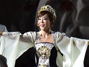 South Korean soprano Sumi Jo performs a solo during the opening ceremony of the 2014 Asian Games at the Incheon Asiad Main Stadium in Incheon on September 19, 2014.
