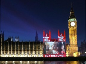 Band Aid 30 is projected onto the The Palace of Westminster on December 7, 2014 in London, England.