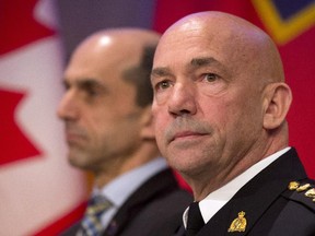 RCMP Commissioner Bob Paulson (Foreground) is pictured in Ottawa, Monday December 1, 2014.