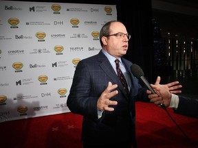 Brent Butt speaks with media on the red carpet at the Ottawa premier of Corner Gas: The Movie, at the Canadian Museum of History on Mon, December 1, 2014.