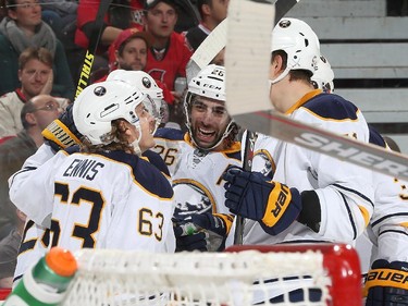 Teammates Matt Moulson #26 and Tyler Ennis #63 of the Buffalo Sabres celebrate a second period goal.