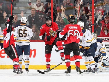 Bobby Ryan #6 of the Ottawa Senators celebrates his second period goal with team mates Jean-Gabriel Pageau #44 and Mike Hoffman #68.