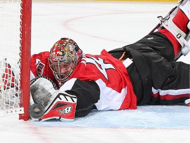 Craig Anderson #41 of the Ottawa Senators makes a diving save against the Buffalo Sabres in the second period.