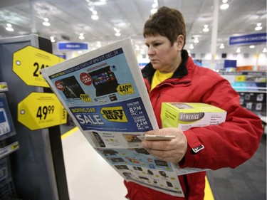Cecile Dumont came all the way from Quyon, Que., about an hour's drive, for Boxing Day sales at Best Buy on Merivale Road, Dec. 26, 2014.
