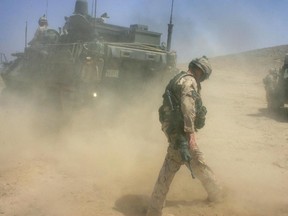 PANJWAI, AFGHANISTAN - JUNE 12:  Canadian army soldiers arrive in Panjwai June 12, 2006 an area west of Kandahar, in southern Afghanistan. Canadian and Afghan forces launched a fresh offensive against Taliban insurgents in Panjwai today, and two Canadians were wounded in the fighting.