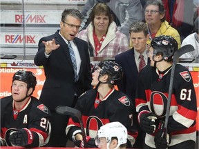 Dave Cameron coaches his first game as the new head coach for the Ottawa Senators during first period action against the LA Kings in Ottawa, December 11, 2014.  (Jean Levac/ Ottawa Citizen)