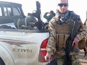 Dillon Hillier, 26, suited up for battle against a pickup truck with an RPG in the back.