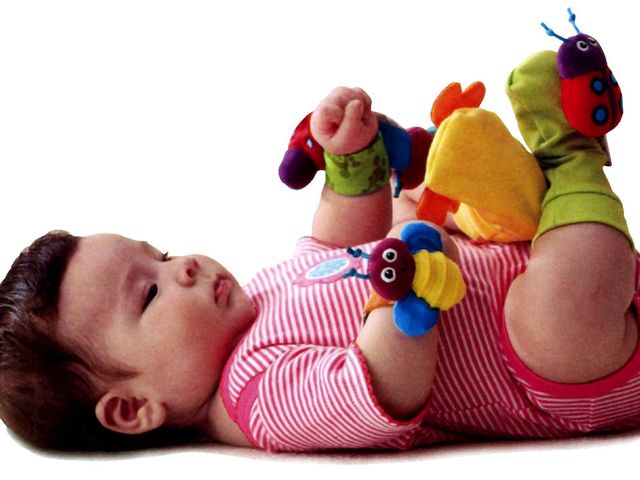 For the bouncing baby: Lamaze foot and wrist rattles, $19.99 at Mastermind Toys