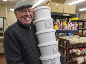 Former Vanier mayor Guy Cousineau helps out every Wednesday at the Partage Vanier Food Bank.