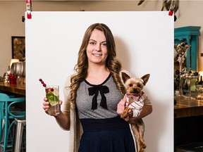 Meredith Brown, a server at the Hintonburg Public House, with her 'Faux-hito' cocktail and her dog- Jake.