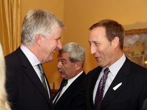 From left, British High Commissioner Howard Drake shares a laugh with federal Justice Minister Peter MacKay at a reception Drake hosted for the Scottish Society of Ottawa on Tuesday, December 2, 2014, at Earnscliffe.