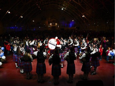 Glengarry Pipe Band from Maxville performs during the TD Hogmanay 2014 celebration by The Scottish Society of Ottawa held at Aberdeen Pavilion on Wednesday, Dec. 31, 2014.