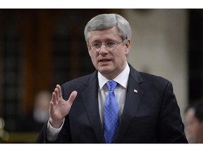 Prime Minister Stephen Harper answers a question during question period in the House of Commons, Tuesday, Dec. 9, 2014 in Ottawa.