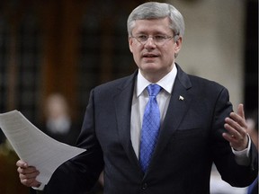 Prime Minister Stephen Harper answers a question during question period in the House of Commons, Tuesday, Dec. 9, 2014 in Ottawa.