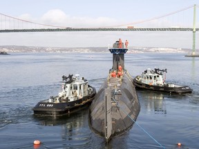 English/Anglais
HS2009-0144-002
01 April 2009
Halifax, Nova Scotia

The tugs tow and guide the submarine to Bedford Basin where it will be loaded onto the heavy left vessel MV Tern.

Her Majesty Canadian Ship (HMCS) Chicoutimi is transferred by tugs and docked onto Merchant Vessel (MV) Tern for transport from Halifax, NS to Esquimalt, BC via the Panama canal. 

The MV Tern is partially submerged in the Bedford Bassin. HMCS Chicoutimi will undergo repairs at destination.

Please credit: Cpl Dany Veillette, Formation Imaging Services Halifax, Nova Scotia.

French/Français
HS2009-0144-002
1er avril  2009
Halifax (Nouvelle-Écosse)

Les remorqueurs tirent et guident le sous-marin vers le bassin de Bedford, où il sera chargé à bord du navire transporteur pour poids lourds Tern. 

Le Navire canadien de Sa Majesté (NCSM) Chicoutimi est tiré par des remorqueurs et chargé à bord du navire marchand Tern. Il sera transporté de Halifax, en Nouvelle Écosse, jusqu’à Esquimalt, en Colombie-Britannique, par le c