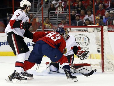 Washington Capitals center Jay Beagle (83) watches his goal get past Ottawa Senators goalie Craig Anderson (41) as defenseman Jared Cowen (2) stands nearby in the second period.