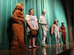 From left, Lion played by Jaida Welsh, Dorothy played by Olivia Kennedy, Tinman played by James Plant, Scarecrow played by Jessica Paquette and Tree played by Zara Barghouth during St. Patrick's High School's Cappies production of No Place Like Home, December 4, 2014, in Ottawa, On.