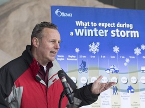 Luc Gagné, manager of roads services with Ottawa's Public Works Department, briefed members of the media on the city's winter storm tactics for this upcoming season at a demonstration in Ottawa at the Conroy Yard, Dec. 9, 2014.