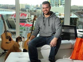 Luke Leslie and his beloved boxer, Bowe, are among the first residents at Lansdowne Park.