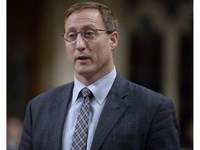 Justice Minister Peter MacKay answers a question during question period in the House of Commons, Monday, December 8, 2014 in Ottawa.