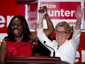 Mitzie Hunter, here celebrating her 2013 election win with Ontario Premier Kathleen Wynne, will help work out details of the new pension program.