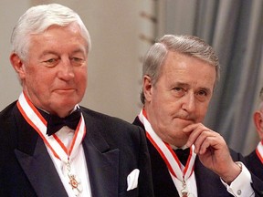 From left, Jean Beliveau, and former Prime Minister Brian Mulroney, after being invested into the Order of Canada at a ceremony in Ottawa on Oct. 22, 1998.