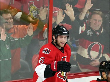 Fans react as Ottawa Senators' Bobby Ryan (6) celebrates his goal against the Buffalo Sabres during first period NHL hockey action.