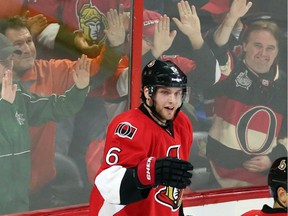 Fans in the Canadian Tire Centre react as the Ottawa Senators' Bobby Ryan celebrates one of his three goals against the Buffalo Sabres on Monday, Dec. 29, 2014.