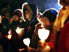 Files: A vigil to remember the Montreal Massacre in 2009 at Ottawa's Minto Park, Dec. 9, 2009.