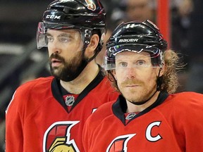 Daniel Alfredsson (R) and Chris Phillips (L) spent a lot of years together building the Ottawa Senators brand.