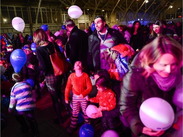 Parents and children celebrate the 7 p.m. countdown of the New Year in Scotland during the TD Hogmanay 2014 celebration .