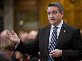 Parliamentary Secretary Paul Calandra responds to a question during Question Period on December 2, 2013 in Ottawa. The following year would not be a good one for him in the House of Commons.
