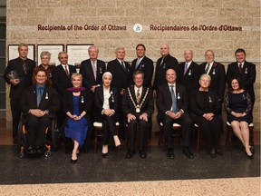 Recipients of the Order of Ottawa for 2014 are, in back row from left, Greg Patacairk (Brian Kilrea Award for Excellence in Coaching), Mary Wiggin, Dr. Qais Ghanem, Greg Kane, Q.C., Tom Schonberg, David Gourlay, Jesse Stewart, Ph.D., Glenn McInnes, Gary Sealey, Gilles LeVasseur. In the front row are Peter Morel, Barbara Crook, Dr. Angel Arnaout, Mayor Jim Watson, Dr. Tim Aubry, Mariette Carrier-Fraser and Nicole Fortier.