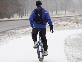 Ron Vallieres was pictured unicycling westbound along the Sir John A. Macdonald Parkway.