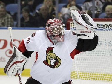 Ottawa Senators goaltender Robin Lehner, of Sweden, has the puck go off the crossbar during the first period.