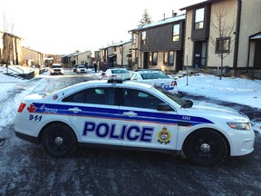 The scene at the 2000 block of Beaconwood Drive Thursday morning, as police investigate two suspicious deaths.