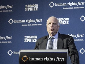 Sen. John McCain (R-AZ) delivers remarks during a gala event hosted by the Human Rights First organization, at the Newseum, December 10, 2014 in Washington, DC. Sen. Dianne Feinstein (D-CA) and Sen. John McCain (R-AZ) were honored by the organization "their commitments to ending the use of torture to interrogate terrorism suspects."