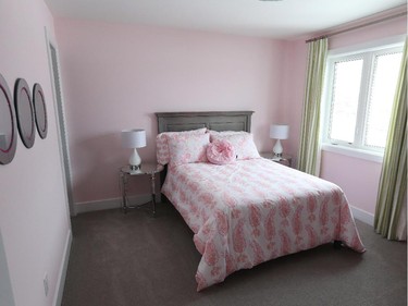 Charming pink bedroom in the Lakefield.