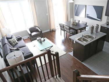 The Topaz is the smallest townhome model but it will wow those who like open-concept living, with its kitchen and eating bar well lit by two large windows overlooking the living/dining area.