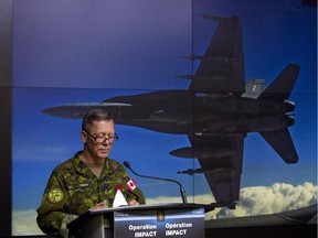 Canadian Lieutenant-General Jonathan Vance, Commander of Canadian Joint Operation Command, holds a technical briefing on combat strikes against the Islamic State of Irag (ISIL) in Ottawa, at National Defence Heaquarters, Tuesday November 4, 2014.