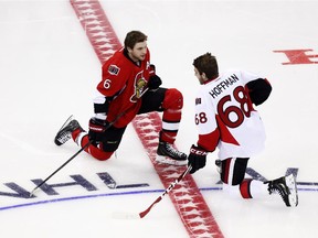 Bobby Ryan and Mike Hoffman chat prior to the NHL All-Star Skills Competition Saturday.