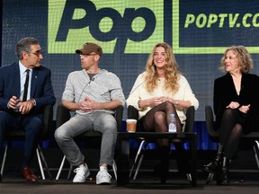 Actors Eugene Levy, Chris Elliott, Annie Murphy and Catherine O'Hara speak onstage during the 'Schitt's Creek' panel at the Pop Network portion of the 2015 Winter Television Critics Association press tour at the Langham Hotel on January 9, 2015 in Pasadena, California.