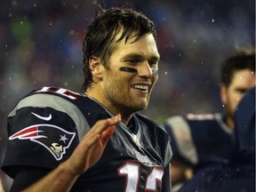 Tom Brady #12 of the New England Patriots reacts on the sideline in the second half against the Indianapolis Colts of the 2015 AFC Championship Game at Gillette Stadium on January 18, 2015 in Foxboro, Massachusetts.