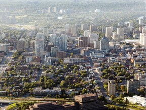 An aerial photograph taken from a hot air balloon shows downtown Ottawa and the Byward Market in Friday, August 29, 2014. The 27th Gatineau Hot Air Balloon Festival got under way Friday and runs for five days. (Darren Brown/Ottawa Citizen)