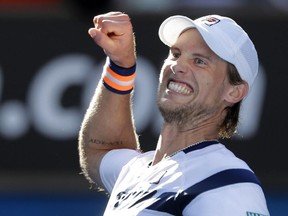 Andreas Seppi of Italy celebrates after defeating  Roger Federer of Switzerland in their third round match at the Australian Open tennis championship in Melbourne, Australia, Friday, Jan. 23, 2015.