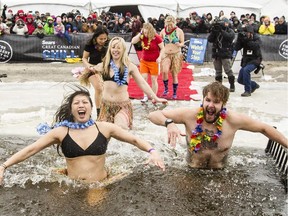 Around 300 people kicked off the new year with an icy plunge into the Ottawa River at Britannia Beach during the Sears Great Canadian Chill Thursday January 1, 2015. Over $50,000 was raised to fight childhood cancer.